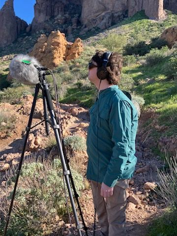 Photo of Brandon recording soundscapes at the Superstition Mountains in Arizona